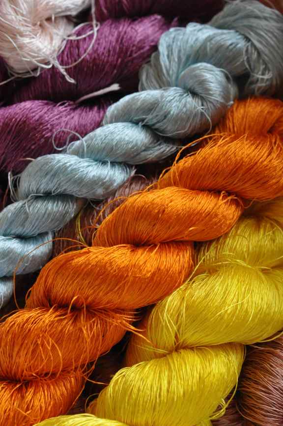 Lao silk threads - hand dyed with local natural materials likes roots and seeds.