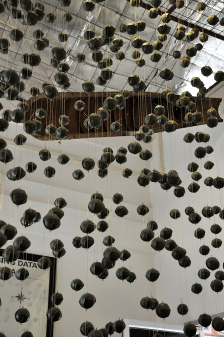 COPE Center exhibit- what a cluster bomb and bombies look like.